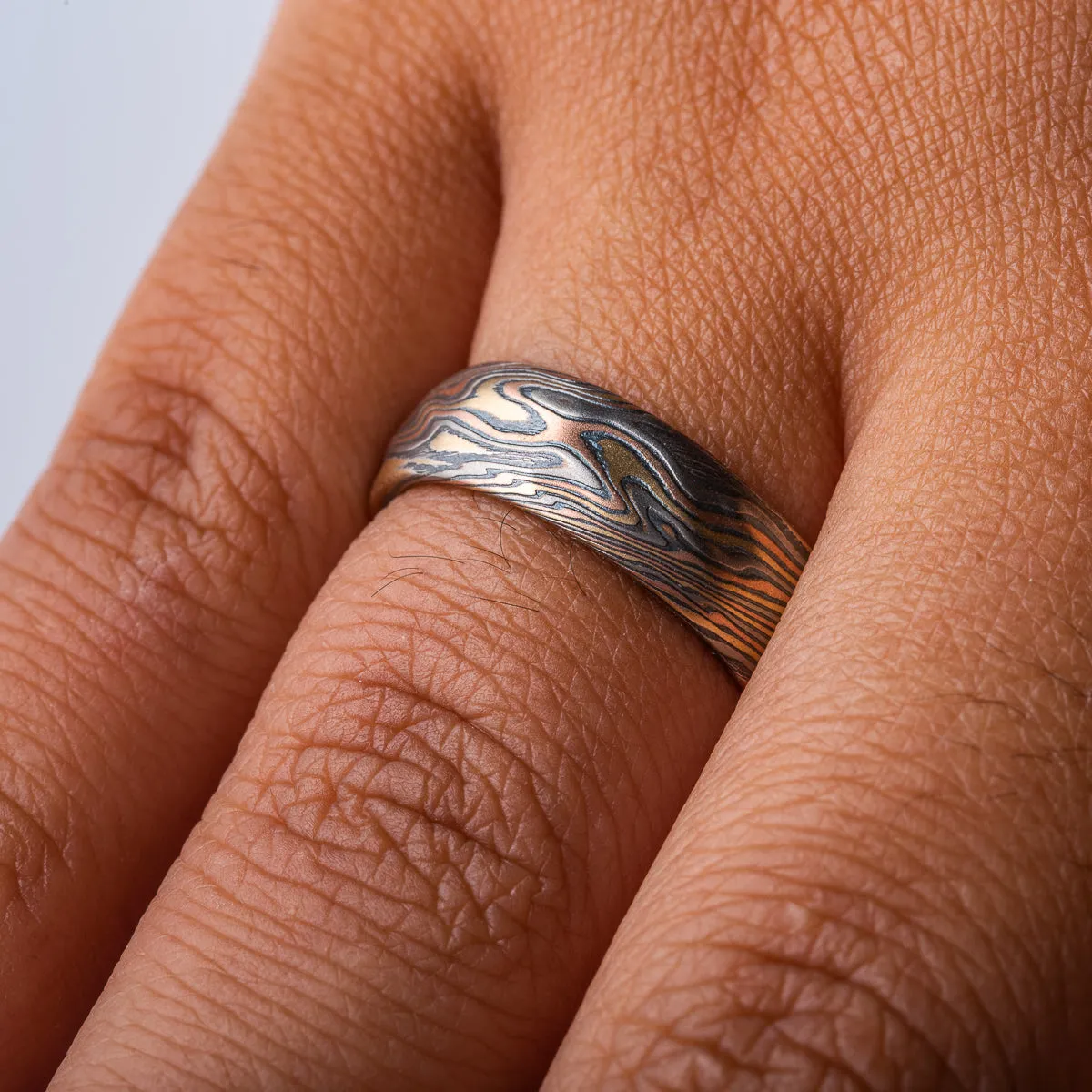 Kazaru Texture Mokume Ring in Firestorm