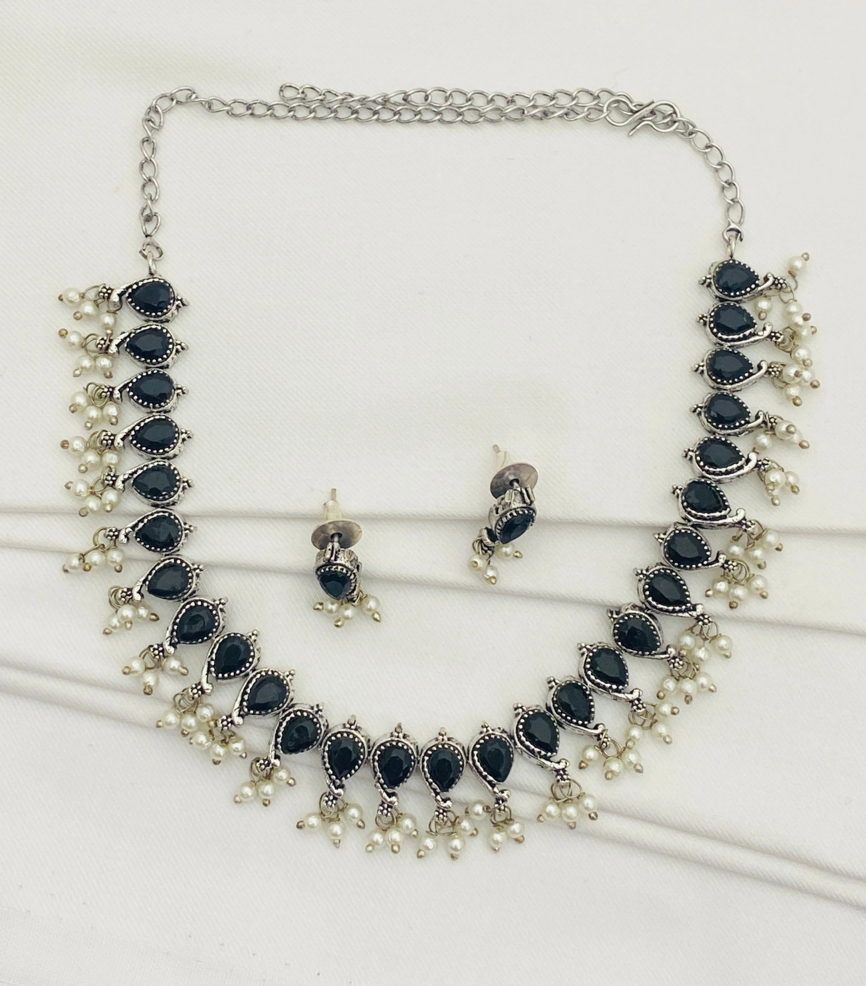 Lovely Black Color German Silver Plated Oxidized Short Neckpiece With Matching Earrings And Pearl Drops