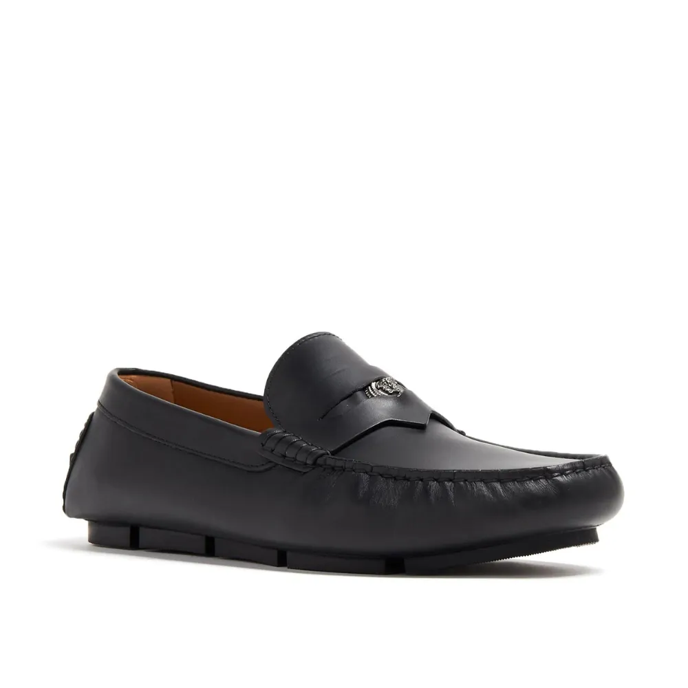 Medusa-plaque leather loafers