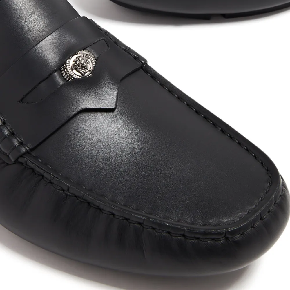 Medusa-plaque leather loafers